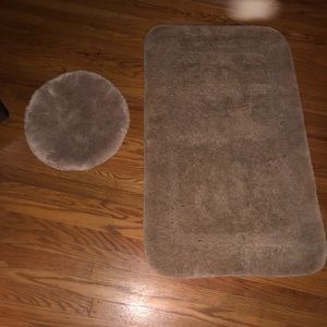 Bathroom rug and toilet seat cover